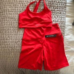 Set active limited edition never dropped red luxform biker shorts and sports bra